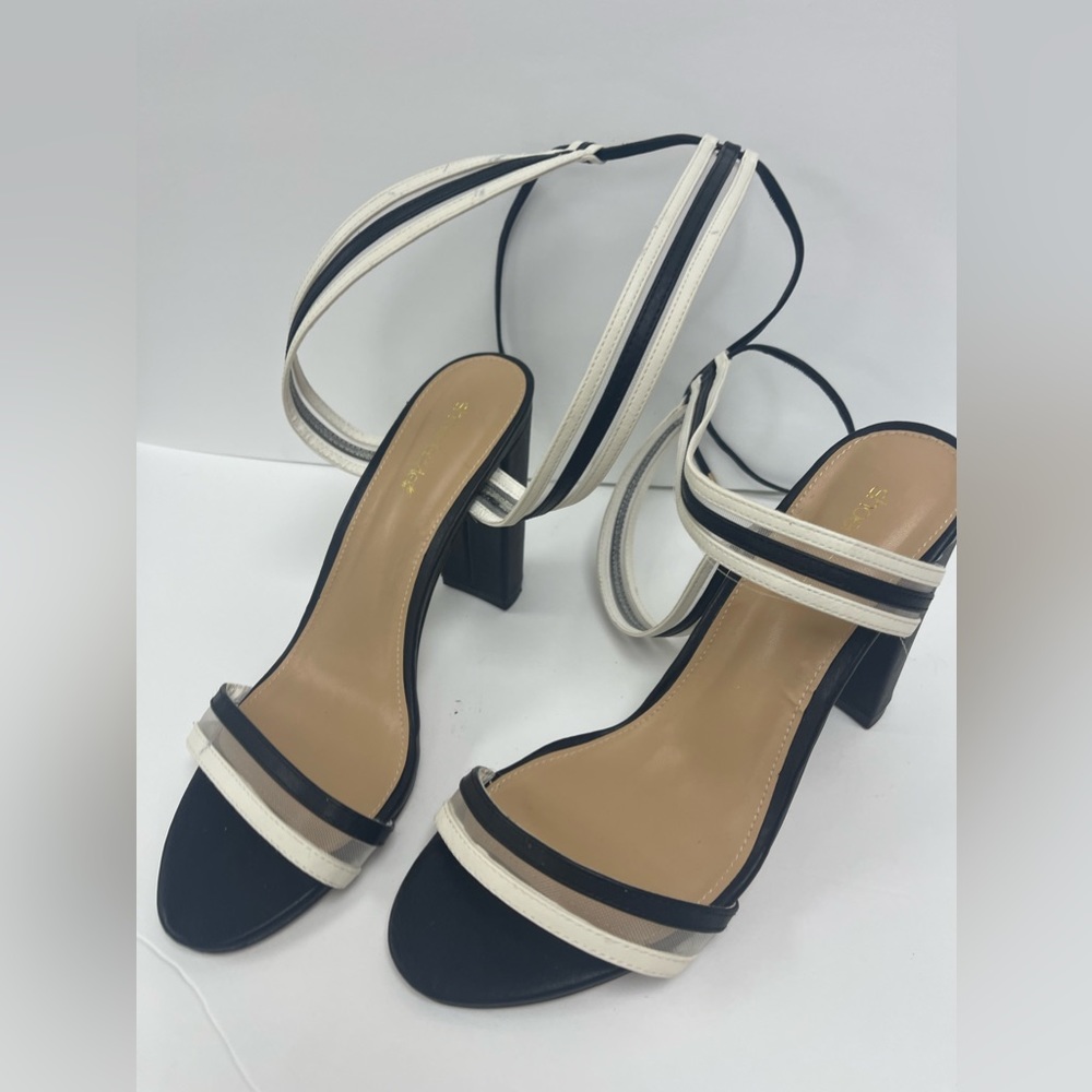 Size 12.  Black white stripe heel by Shoe Dazzle